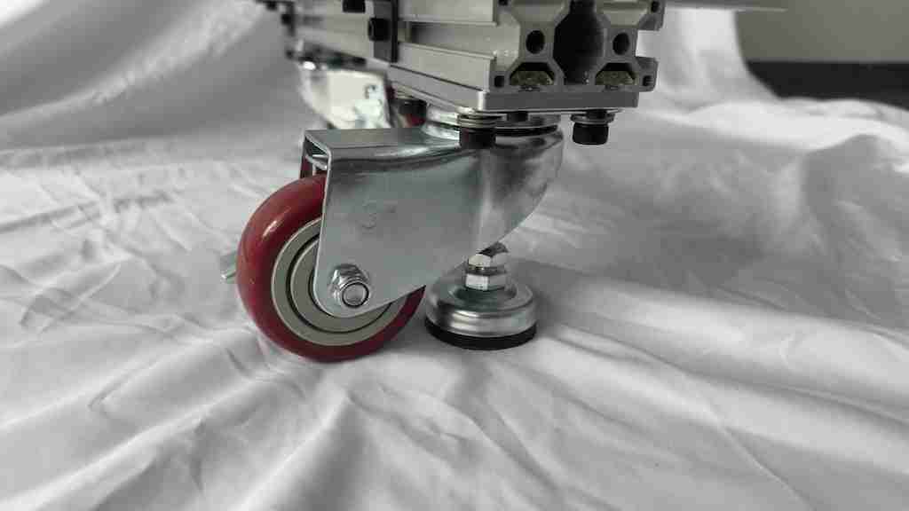 Leveling support caster and foot beneath DXonJet horizontal wall printer track