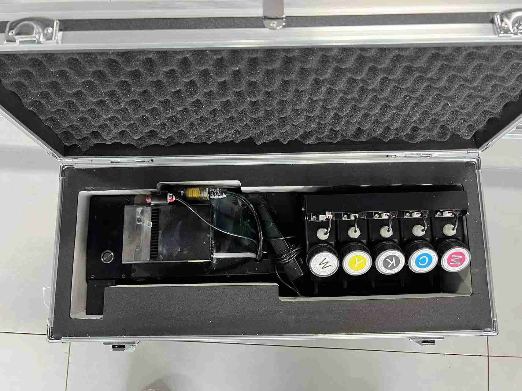 DXonJet printhead carriage protected within a fitted foam-lined transport case